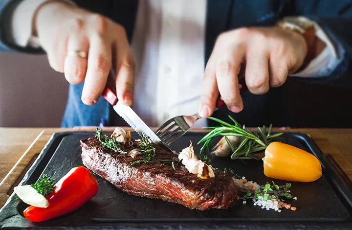 ButcherBox grass-fed steak being sliced