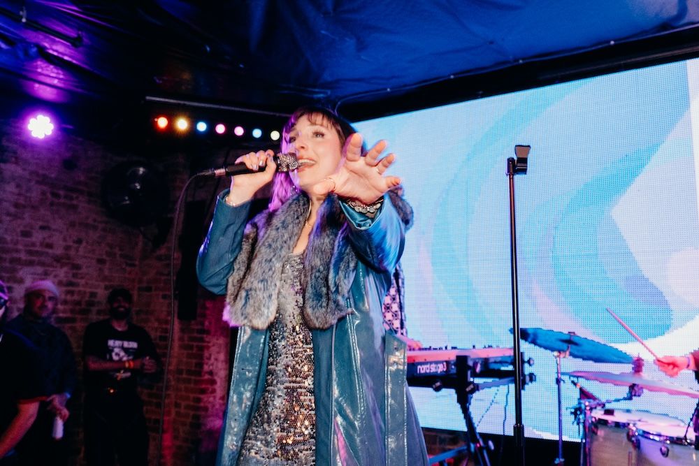 Heavy Bloom play live at Baba Yaga - singer Jeanie Marinella shown - photo by Conner Yi