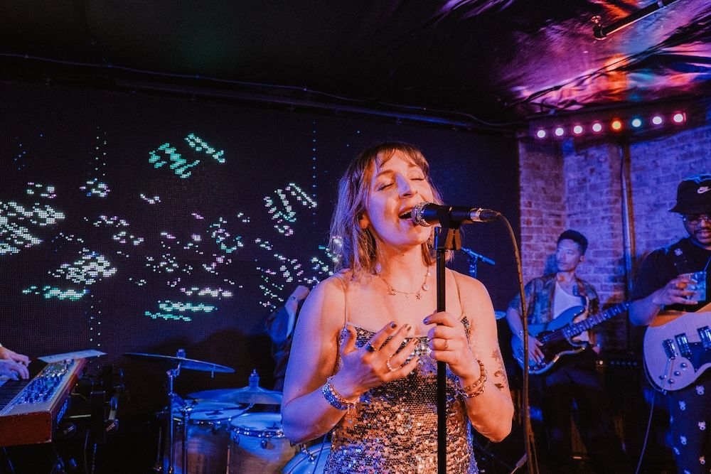 Heavy Bloom play live at Baba Yaga - singer Jeanie Marinella - photo by Conner Yi